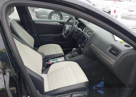 2016 Volkswagen Jetta 1.8T Sport z USA, uszkodzony, nr VIN 3VWD17AJ3GM386447